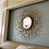 Metallic scrollwork backsplash- created with Artist Jason Hulfish