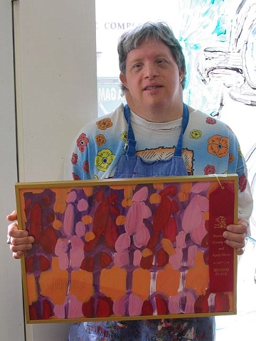 Marvin Willrodt with a red ribbon for
"Seven Flowers"