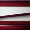 Cochineal-dyed wool on the warping board