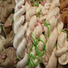 Skeins of silk, wool, and cotton ready to be dyed