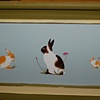 Bunny Trio on Antique Sleigh Bed