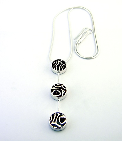 sterling silver three disc pendant with mokume gane