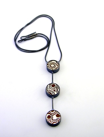 sterling silver three disc pendant with mokume gane