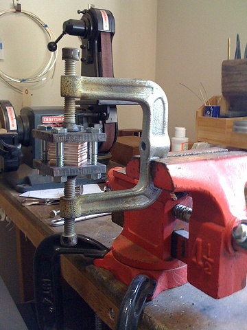 Metal in c-clamp