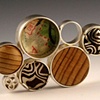 Seven Disc Cluster Pin