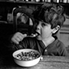 Boy eating cereal