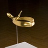 cast plastic, 24 karat gold