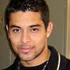 Wilmer Valderrama wearing Fine Silver Hand Made pendant on Oxydized Sterling Silver Chain with Black Leather and Sara Saltanovitz wearing Crystal/Copper Vest VE 1009