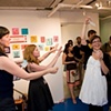 Handing out a check to artist/employee Janine Menlove at a Payday Party