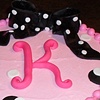 dotty initial cake with dotty bow