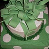 square and round with dots and big bow