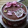 brown and pink baby clothesline
