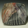 Bowl with Inlaid Fossil