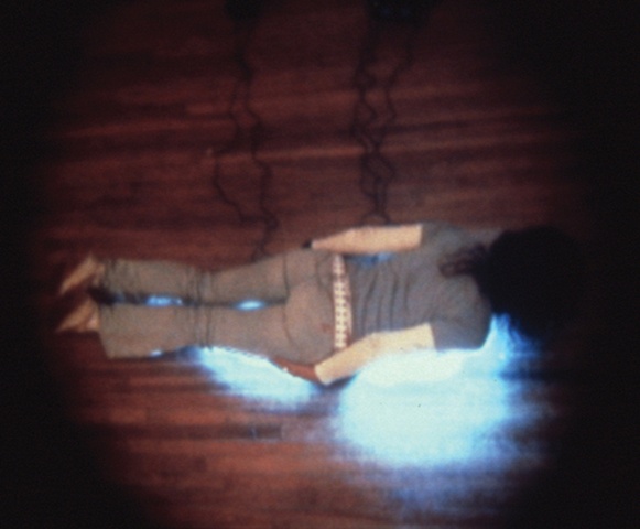 video still: Me On Neon from interior of A 1:16 Scale Model of �The Temporary Katie Centre...