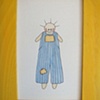 blue/yellow stripy boy in yellow frame
