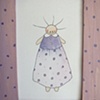 dotty lilac girl in dotty frame
