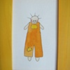 orange and yellow boy in yellow frame
