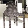 Where There's Smoke Chair with Holes Installation
