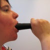 I am sitting in a room with a microphone in my mouth.