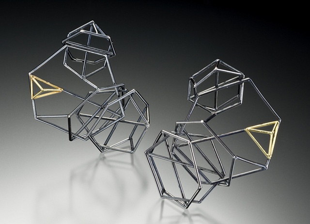 structure earrings with inclusions