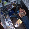 Robin tattooing George
