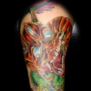 dragon face tattoo by tatupaul