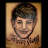 portrait of boy tattoo by tatupaul