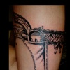 pistol  tattoo by tatupaul