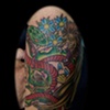 lion and snake tattoo by tatupaul.com
