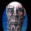 evil face tattoo by tatupaul.com