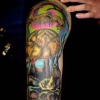 salvador dali swirls tattoo by tatupaul