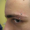 eye brow piercing by tatupaul