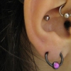 tragus piercing by tatupaul
