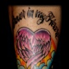 traditional heart tattoo by tatupaul
