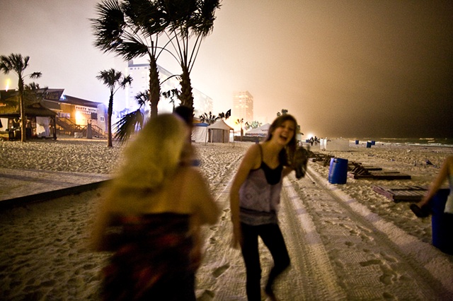 On the beach at night.