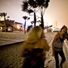 On the beach at night.