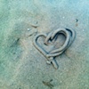 64 Worm hole heart in sea on beach W Sussex by Hannah Edy 23 Aug 2009