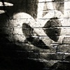 55 Silver graffiti heart on railway bridge North London UK by Hannah Edy 27 Sep 2009