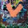 46 Orange graffiti brick heart North London UK by Hannah Edy 27 Sep 2009