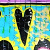 16 Black & yellow graffiti heart on towpath near olympics London by Hannah Edy 14 Aug 2009