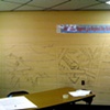 Drawings of the "postcard" murals in teachers lounge, before they were painted by volunteers 