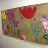 Original brown paper flower garden mural by students 