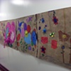 Original brown paper flower garden mural by students 