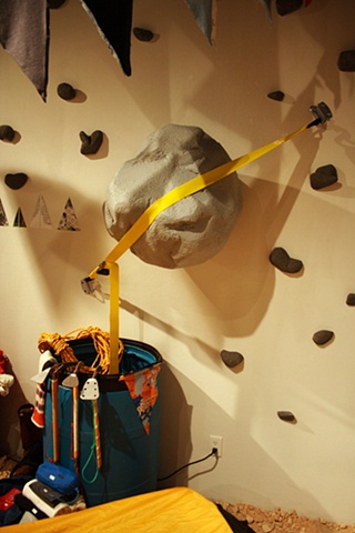 the boulder strapped perilously over my tent