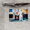 Inmate Christmas Portrait on torn chair, 2006