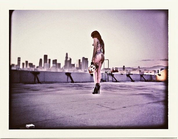 miss crash, pensive on the rooftops of studio servitu overlooking los angeles