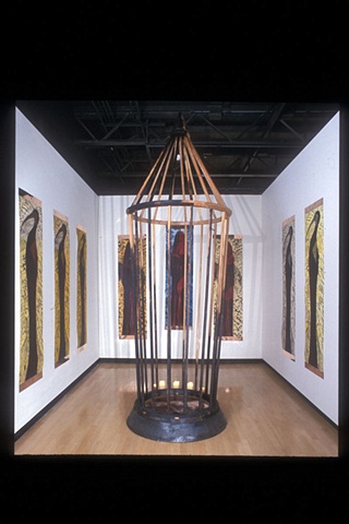woodcut and cage, scuptural installation ibis and cardinal icons  by jill Fitterer