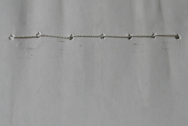 untitled (sewing card across)