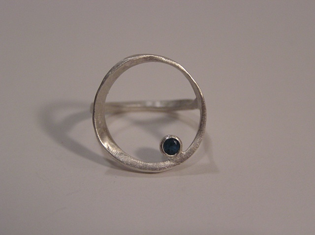 This ring is available with a variety of different faceted or cabochon cut stones.