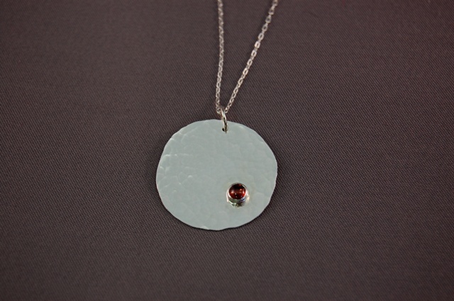 Forged and fabricated with cabochon or faceted cut stones. Patina also available.
